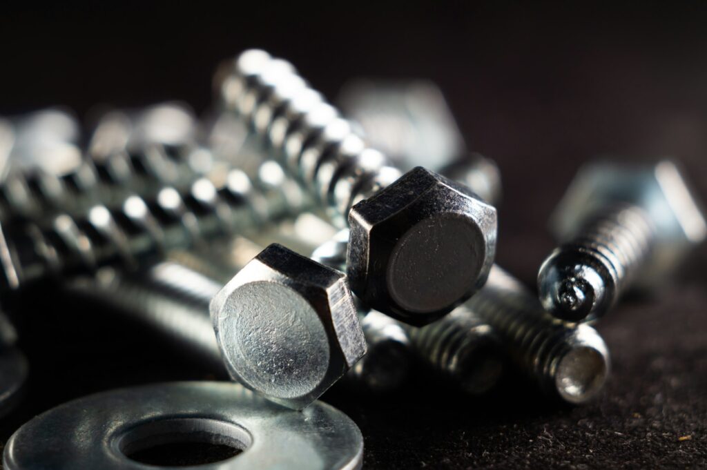 Close-up photo of a set of fasteners on a black surface